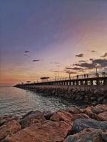l sunset landscape of alicante spain with pier photo
