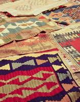 interesting background with handmade Turkish rugs in close-up photo