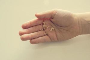 tasty  little Easter cupcake on a child's hand on a light background photo