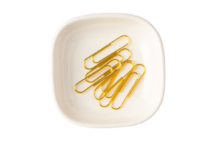 White plate with gold clips isolated on a transparent background png