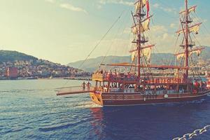 original landscape of the port and city of Alanya in Turkey from the sea photo