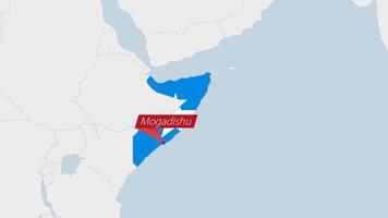 Somalia map highlighted in Somalia flag colors and pin of country capital Mogadishu. vector