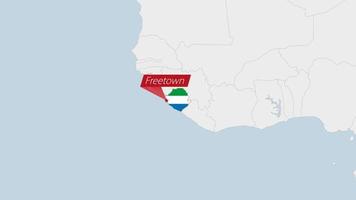 Sierra Leone map highlighted in Sierra Leone flag colors and pin of country capital Freetown. vector