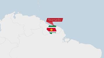 Suriname map highlighted in Suriname flag colors and pin of country capital Paramaribo. vector