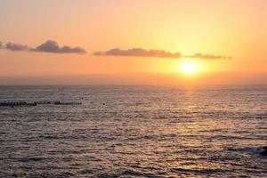 Sunset over the sea photo