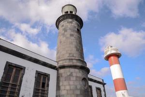 Lighthouse by the sea photo