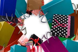 Small gift with red bow on white background. photo