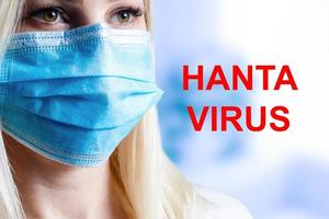 woman with medical mask for protection from hantavirus with text photo