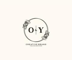 initial OY letters hand drawn feminine and floral botanical logo suitable for spa salon skin hair beauty boutique and cosmetic company. vector