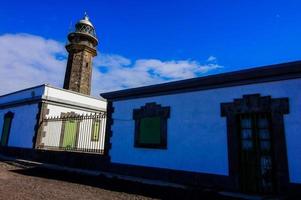 Lighthouse by the sea photo