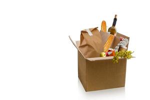 Fruits and vegetables crates and boxes in delivery van photo