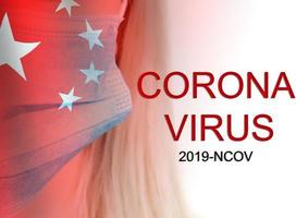 The phrase Corona virus on a banner with blurred Chinese flag on the background. photo