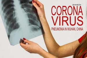 Infectious doctor exam and screening for novel Coronavirus that cause mysterious viral pneumonia in China. This outbreak like Sars virus respiratory syndrome.pandemic disease photo