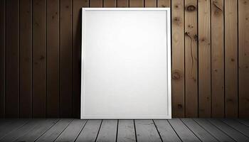 Blank white paper poster on plank wooden floor and wall. photo