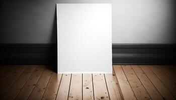 Blank white paper poster on plank wooden floor and wall. photo