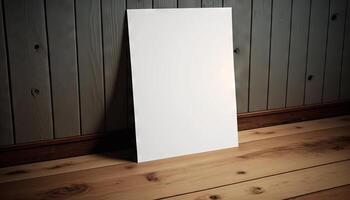 Blank white paper poster on plank wooden floor and wall. photo