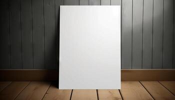 Blank white paper poster on plank wooden floor and wall. photo