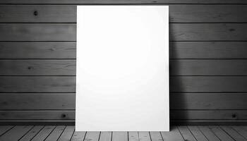 Blank white paper poster on plank wooden floor and wall. photo