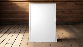 Blank white paper poster on plank wooden floor and wall. photo