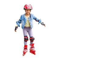 Cute girl in roller skates on a white background photo