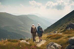 Senior couple hiking in mountains. Elderly tourists with bikepacks travelling outdoor. photo