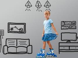 Happy child playing into new home. little girl rollerblading. hand-drawn apartments photo