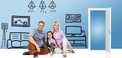 Happy family sitting on wooden floor. Father, mother and child having fun together. Moving house day, new home and design interior concept photo