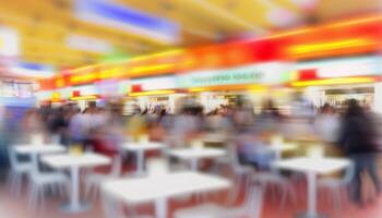 Abstract blur food court in shopping mall for background. photo