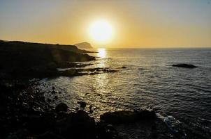 Sunset over the sea photo