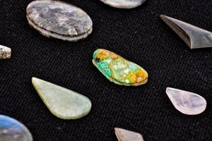 Gemstones on dark background photo