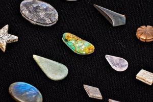 Gemstones on dark background photo