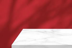 White Marble Table Corner with Light Beam, Shadow, and Spotlight on the Red Concrete Wall Background, Suitable for Product Presentation Backdrop, Display, and Mock up. photo