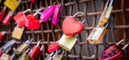 Love locks, concept for engagement, happiness, marriage and romantic relationship photo