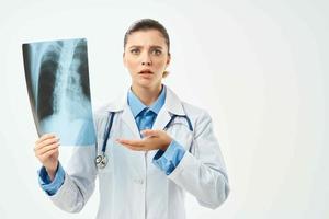 emotional radiologist x-ray hospital light background photo