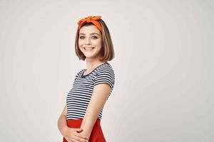 woman in striped t-shirt studio posing orange bandage photo