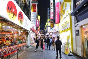 SEOUL, SOUTH KOREA - NOV 13, 2017-Myeong-dong is one of the busiest places in Seoul and is among Korea's premier shopping destinations. photo