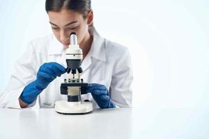 cheerful female doctor laboratory research science diagnostics photo