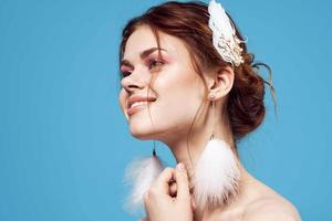 pretty woman fluffy earrings bright makeup cropped view model photo