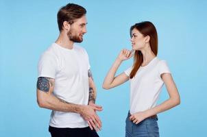 man with tattoos next to woman communication dating friendship modern styles photo