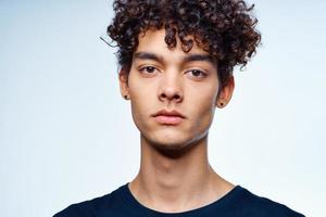 cute guy with curly hair cropped view isolated background studio photo