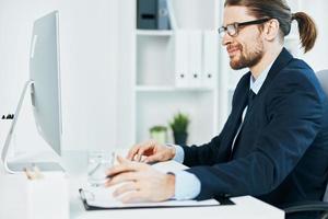 business man in suit work desk documents office photo