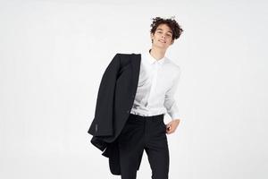 handsome man curly hair jacket self-confidence modern style business photo
