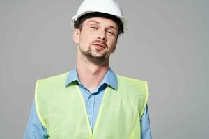 man in white helmet Professional Job isolated background photo