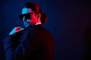 portrait of a man modern style suit fashion sunglasses lifestyle model photo