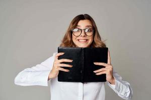 Business woman in white shirt documents work official photo