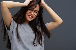 Brunette in a t-shirt glasses Youth style fun isolated background photo