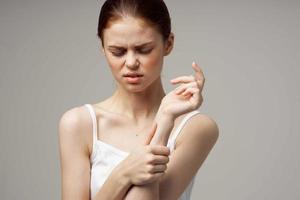 woman rheumatism arm pain health problems isolated background photo