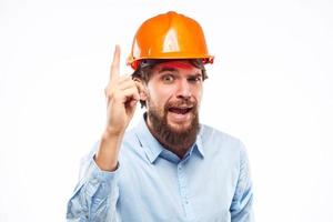 Engineer in orange coloring safety professionals construction emotions hand gestures photo