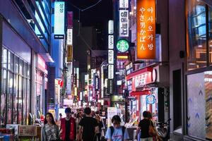 SEOUL, SOUTH KOREA - APR 24, 2019-Myeong-dong is one of the busiest places in Seoul and is among Korea's premier shopping destinations. photo