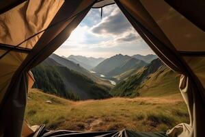 Amazing view from inside tent to mountain landscape. Camping during hike in mountains. photo